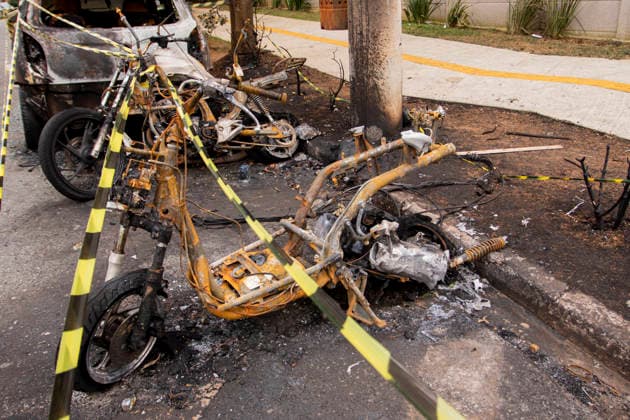 SaO PAULO, SP - 05.10.2026: QUEDA DE CABOS CAUSA INCêNDIO EM SaO PAULO - The fall of high-voltage power lines caused a large fire in Sao Paulo. Likely due to the rain, storm, and winds this past weekend in the southern part of the city, high-voltage power lines belonging to the electricity company Enel broke, causing a fire that engulfed numerous vehicles, including several motorcycles and a car. The vehicles were completely destroyed by the fire. All vehicles were parked legally on the street when the accident occurred. The owners are in talks with Enel to determine responsibility and compensation. The event took place on Rua Cannes, in the Veleiros neighborhood, near Capela do Socorro, Sao Paulo, on October 5, 2026. x3025753x VanxCampos