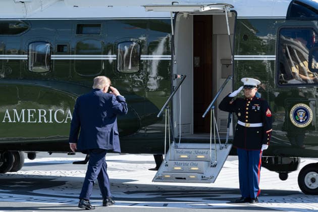 October 5, 2026, Washington, District Of Columbia, United States: President DONALD TRUMP walks across the South Lawn of the White House before departing aboard Marine One for Grand Island, Nebraska, where he is scheduled to hold a midterm campaign rally in support of Republican Sen. PETE RICKETTS. Washington United States - ZUMAk206 20261005_znp_k206_008 Copyright: xMattxKaminskyx