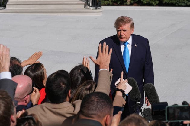 President Trump departs White House for Nebraska midterm campaign rally WASHINGTON, D.C., UNITED STATES - OCTOBER 05: U.S. President Donald Trump speaks to press members before boarding Marine One on the South Lawn of the White House in Washington, D.C., on October 5, 2026. Trump is traveling to Nebraska to attend a midterm campaign rally. Mehmet Eser Anadolu Washington United States. Editorial use only. Please get in touch for any other usage.  Copyright: x2026xAnadoluxMehmetxEserx