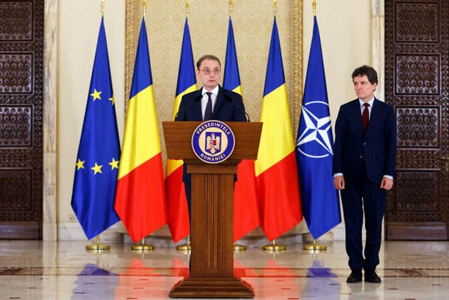 (261005) -- BUCHAREST, Oct. 5, 2026 -- Luca Niculescu (L) speaks at a press conference in Bucharest, Romania, Oct. 5, 2026. Romanian President Nicusor Dan designated Luca Niculescu, state secretary at the Ministry of Foreign Affairs, to form the government on Monday evening, according to Romania s national news agency Agerpres. (Photo by Xinhua) ROMANIA-BUCHAREST-PM-NOMINATION CristianxCristel 
