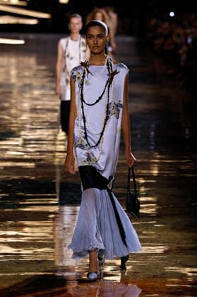 (261006) -- PARIS, Oct. 6, 2026 -- A model presents a creation from the Womenswear Spring Summer 2027 collections by Chanel during the Paris Fashion Week in Paris, France, Oct. 5, 2026. ( Handout via Xinhua) FRANCE-PARIS-FASHION WEEK-CHANEL MeetEurope 