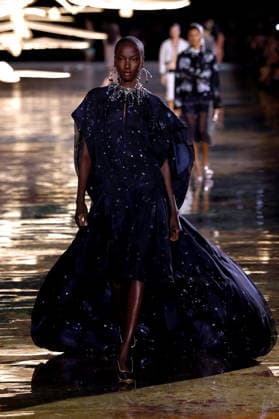 (261006) -- PARIS, Oct. 6, 2026 -- A model presents a creation from the Womenswear Spring Summer 2027 collections by Chanel during the Paris Fashion Week in Paris, France, Oct. 5, 2026. ( Handout via Xinhua) FRANCE-PARIS-FASHION WEEK-CHANEL MeetEurope 
