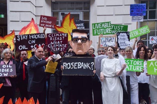 October 6, 2026, London, England, United Kingdom: Activists from the group Fossil Free London stage a protest against the Rosebank oil field and the Jackdaw gas field outside the Department for Energy Security and Net Zero. Activists dressed as angels urge a protester wearing an Andy Burnham mask to stop the fossil fuel projects in the North Sea while activists dressed as demons urge him to drill for more oil. London United Kingdom  - ZUMAv130 20261006_zip_v130_003 Copyright: xVukxValcicx