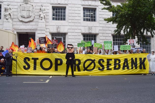 October 6, 2026, London, England, United Kingdom: Activists from the climate action group Fossil Free London stage a protest against the Rosebank oil field and the Jackdaw gas field outside the Department for Energy Security and Net Zero. Activists dressed as angels urge a protester wearing an Andy Burnham mask to stop the fossil fuel projects in the North Sea while activists dressed as demons urge him to drill for more oil. London United Kingdom  - ZUMAv130 20261006_zip_v130_029 Copyright: xVukxValcicx