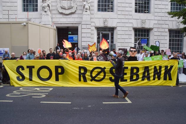 October 6, 2026, London, England, United Kingdom: Activists gather outside the Department for Energy Security and Net Zero during a protest by the climate action group Fossil Free London against the Rosebank oil field and the Jackdaw gas field. London United Kingdom  - ZUMAv130 20261006_zip_v130_031 Copyright: xVukxValcicx