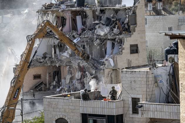 Israeli minister Ben-Gvir poses on bulldozer during demolition of Palestinian home in Jerusalem JERUSALEM - OCTOBER 06: Israeli far-right National Security Minister Itamar Ben-Gvir poses on a bulldozer after taking part in the demolition of a five-story building belonging to Palestinians in East Jerusalem on October 06, 2026. Israeli forces began demolishing the five-story building in the Tur neighborhood with bulldozers in the morning hours. Israeli forces took security measures in the area. Mostafa Alkharouf Anadolu Jerusalem Israel. Editorial use only. Please get in touch for any other usage.  Copyright: x2026xAnadoluxMostafaxAlkharoufx
