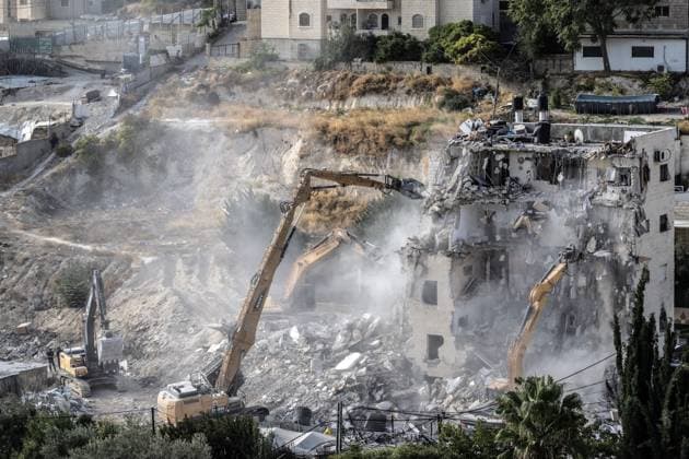 Israeli minister Ben-Gvir poses on bulldozer during demolition of Palestinian home in Jerusalem JERUSALEM - OCTOBER 06: Israeli far-right National Security Minister Itamar Ben-Gvir poses on a bulldozer after taking part in the demolition of a five-story building belonging to Palestinians in East Jerusalem on October 06, 2026. Israeli forces began demolishing the five-story building in the Tur neighborhood with bulldozers in the morning hours. Israeli forces took security measures in the area. Mostafa Alkharouf Anadolu Jerusalem Israel. Editorial use only. Please get in touch for any other usage.  Copyright: x2026xAnadoluxMostafaxAlkharoufx