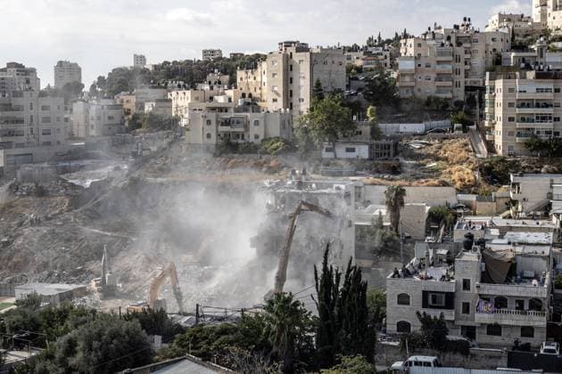 Israeli minister Ben-Gvir poses on bulldozer during demolition of Palestinian home in Jerusalem JERUSALEM - OCTOBER 06: Israeli far-right National Security Minister Itamar Ben-Gvir poses on a bulldozer after taking part in the demolition of a five-story building belonging to Palestinians in East Jerusalem on October 06, 2026. Israeli forces began demolishing the five-story building in the Tur neighborhood with bulldozers in the morning hours. Israeli forces took security measures in the area. Mostafa Alkharouf Anadolu Jerusalem Israel. Editorial use only. Please get in touch for any other usage.  Copyright: x2026xAnadoluxMostafaxAlkharoufx