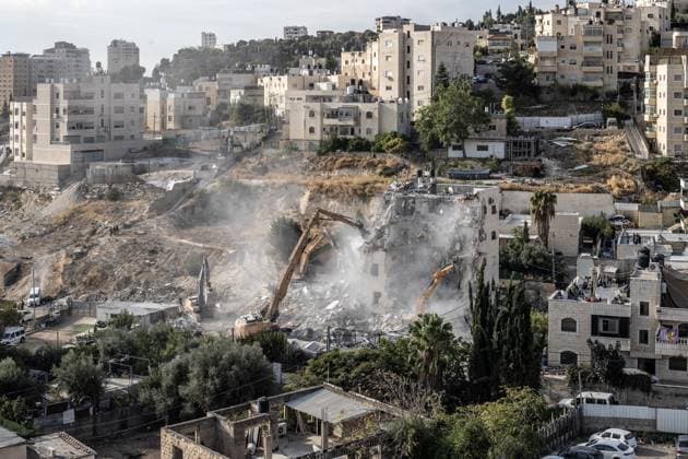 Israeli minister Ben-Gvir poses on bulldozer during demolition of Palestinian home in Jerusalem JERUSALEM - OCTOBER 06: Israeli far-right National Security Minister Itamar Ben-Gvir poses on a bulldozer after taking part in the demolition of a five-story building belonging to Palestinians in East Jerusalem on October 06, 2026. Israeli forces began demolishing the five-story building in the Tur neighborhood with bulldozers in the morning hours. Israeli forces took security measures in the area. Mostafa Alkharouf Anadolu Jerusalem Israel. Editorial use only. Please get in touch for any other usage.  Copyright: x2026xAnadoluxMostafaxAlkharoufx