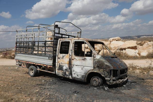 Palestinian Inspects Burned Vehicles Near al-Samu South of Hebron A Palestinian man inspects his burned vehicles near the town of al-Samu, south of Hebron, in the West Bank, on October 6, 2026, after an apparent arson attack believed to have been carried out by Israeli settlers. The incident comes amid an increase in settler attacks on Palestinians and their property in different areas of the West Bank. Photo by Mamoun Wazwaz apaimages Hebron West Bank Palestinian Territory 061026_Hebron_MW_00(22) Copyright: xapaimagesxMamounxWazwazx xapaimagesx