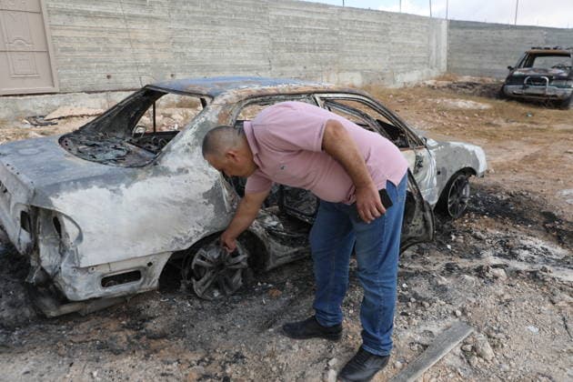 Palestinian Inspects Burned Vehicles Near al-Samu South of Hebron A Palestinian man inspects his burned vehicles near the town of al-Samu, south of Hebron, in the West Bank, on October 6, 2026, after an apparent arson attack believed to have been carried out by Israeli settlers. The incident comes amid an increase in settler attacks on Palestinians and their property in different areas of the West Bank. Photo by Mamoun Wazwaz apaimages Hebron West Bank Palestinian Territory 061026_Hebron_MW_00(18) Copyright: xapaimagesxMamounxWazwazx xapaimagesx