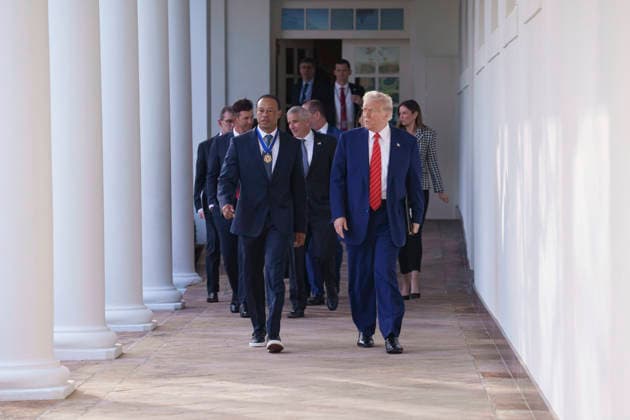 October 6, 2026, Washington, Dc, United States of America: U.S. President Donald Trump walks with golfer Tiger Woods along the West Colonnade of the White House before a reception honoring Black History Month, February 20, 2025 in Washington, D.C. Woods, who received the Presidential Medal of Freedom from Trump in 2019, joined PGA Tour leaders at the White House for talks on a proposed deal with Saudi ArabiaÃ¢â‚¬â ¢s Public Investment Fund before Trump introduced him as a surprise guest at a Black History Month reception. Washington United States of America - ZUMAp138 20261006_zaa_p138_001 Copyright: xJoycexBoghosian WhitexHousex