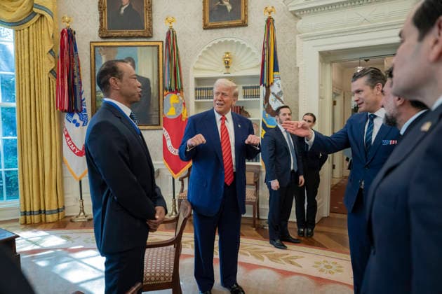 October 6, 2026, Washington, Dc, United States of America: U.S. President Donald Trump speaks with golfer Tiger Woods and officials in the Oval Office of the White House, February 20, 2025 in Washington, D.C. Woods, who received the Presidential Medal of Freedom from Trump in 2019, joined PGA Tour leaders at the White House for talks on a proposed deal with Saudi ArabiaÃ¢â‚¬â ¢s Public Investment Fund before Trump introduced him as a surprise guest at a Black History Month reception. Washington United States of America - ZUMAp138 20261006_zaa_p138_004 Copyright: xJoycexN.xBoghosian WhitexHousex