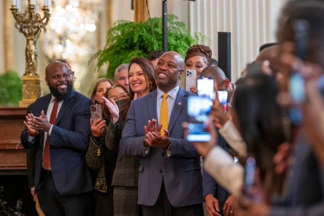 October 6, 2026, Washington, Dc, United States: U.S Senator Tim Scott, R-SC, center, and Secretary of Agriculture Brooke Rollins, left, applaud President Donald Trump during a Black History Month event at the East Room of the White House, February 20, 2025 in Washington, D.C. Washington United States - ZUMAp138 20261006_zaa_p138_020 Copyright: xMollyxRiley WhitexHousex