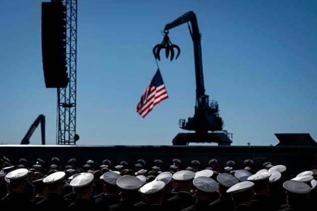 Members of the Navy listen during an event at Tradepoint Atlantic in Sparrows Point, Maryland on Tuesday, Oct. 6, 2026. Anduril is in advanced talks to build an autonomous surface-vessel factory at Tradepoint Atlantic, which would give the company an East Coast hub alongside its Foss Maritime shipyard in Seattle and undersea-vehicle factory at Quonset Business Park in Rhode Island.  BAL20261006105 AlxDrago