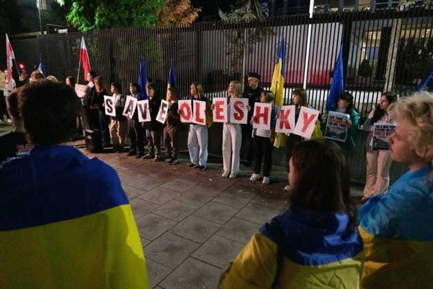 October 6, 2026, Warsaw, Masovian Voivodeship, Poland: Protesters hold placards that spell out save Oleshky during a demonstration outside the US Embassy in Warsaw protesting the humanitarian crisis in Russian-occupied Oleshky. The protest was organized by Poland s Ukrainian diaspora as an appeal to Ukraine s international partners to step up diplomatic efforts to support civilians trapped in Oleshky with humanitarian aid and the possibility of evacuation. Warsaw Poland  - ZUMAk204 20261006_zip_k204_024 Copyright: xRomanxKozielx