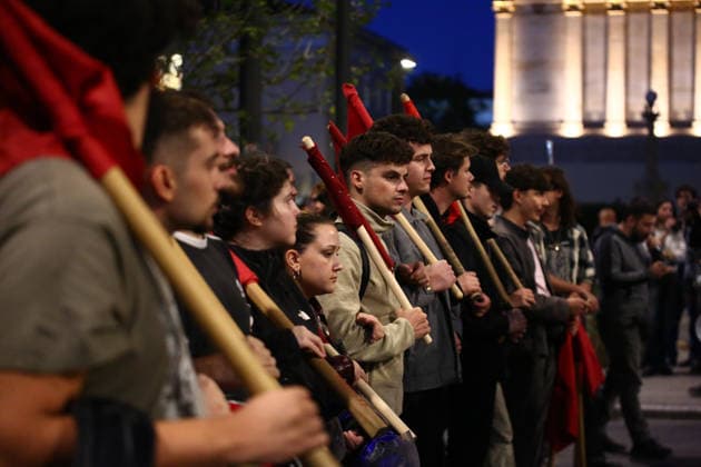 October 6, 2026, Athens, Attica, GREECE: Young protesters stand together holding red flags during an anti-war demonstration opposing the visit of US Secretary of State MARCO RUBIO. Athens GREECE - ZUMAx103 20261006_zip_x103_015 Copyright: xHarrisxXanthopoulosx