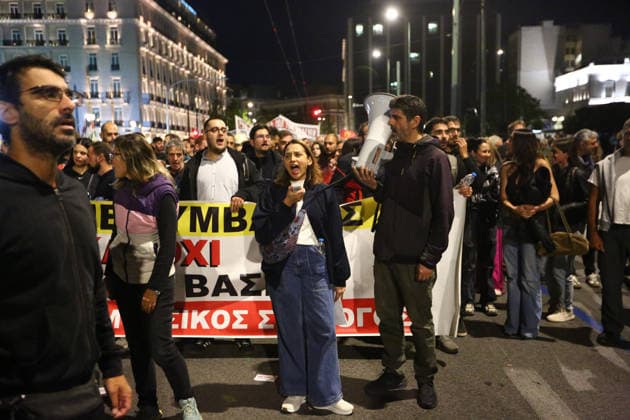 October 6, 2026, Athens, Attica, GREECE: A protester leads chants through a megaphone as demonstrators march during an anti-war protest opposing the visit of US Secretary of State MARCO RUBIO. Athens GREECE - ZUMAx103 20261006_zip_x103_021 Copyright: xHarrisxXanthopoulosx