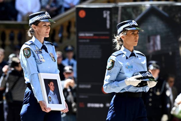 MIA LAY FUNERAL, NSW Police officers carry the hat and a portrait of Mia Lay, during the funeral service for NSW Police Constable Mia Lay at St Andrew s Cathedral, in Sydney, Wednesday, October 7, 2026. Constable Mia Lay, 20, died when the marked vehicle she was a passenger in crashed into a tree early on September 25 in the Sydney suburb of Redfern. ( NO ARCHIVING SYDNEY NEW SOUTH WALES Australia  Copyright: xDANxHIMBRECHTSx 20261007120076997726