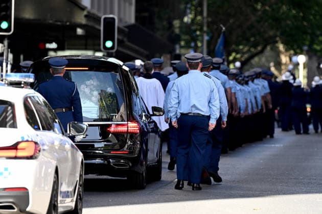 MIA LAY FUNERAL, NSW Police march in a procession on Bathurst street during the funeral service for NSW Police Constable Mia Lay at St Andrew s Cathedral, in Sydney, Wednesday, October 7, 2026. Constable Mia Lay, 20, died when the marked vehicle she was a passenger in crashed into a tree early on September 25 in the Sydney suburb of Redfern. ( NO ARCHIVING SYDNEY NEW SOUTH WALES Australia  Copyright: xDANxHIMBRECHTSx 20261007146366496989