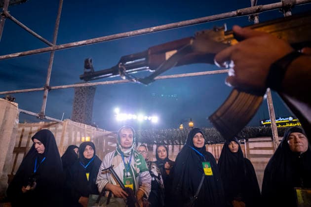 Urban Warfare Training For Iran s Female Self-sacrificing Forces An Islamic Revolutionary Guard Corps (IRGC) serviceman (R) holds an AK-47 rifle during urban warfare training for Iran s female self-sacrificing forces at a city-square military training camp in southern Tehran, Iran, on October 6, 2026, amid rising tensions between Iran and the United States. Tehran Tehran Iran  Copyright: xMortezaxNikoubazlx originalFilename: nikoubazl-urbanwar261006_npE2i.jpg