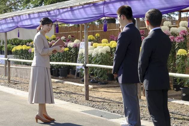 Princess Kako in Kyoto Pref. Japanese Princess Kako (L) visits a chrysanthemum exhibition in Kyotamba in Kyoto Prefecture, western Japan, on Oct. 6, 2026. (Pool photo)  A14AA0005630345P