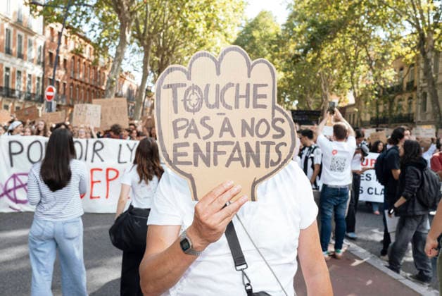 High School And University Student Protest - Toulouse A placard - keep your hands off our children. Protests by secondary school pupils and students calling for improvements to their living and learning conditions, supported by the trade unions CGT, FO, FSU and Solidaires. France, Toulouse, 6 October 2026. Photo by Patricia Huchot-Boissier AbacaPress.com. Toulouse OCCITANIE France  Copyright: xHuchot-BoissierxPatricia ABACAx