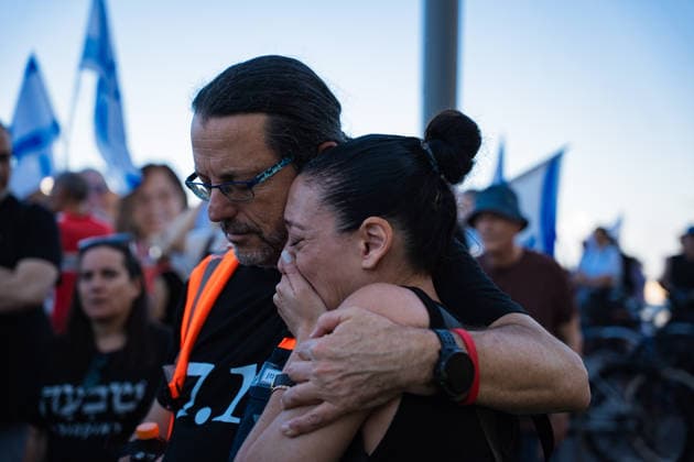 October 7, 2026, Tel Aviv, Tel Aviv, Israel: A protester comforts a tearful woman at a protest blaming the Israeli government for itÃ¢â‚¬â ¢s responsibility for October 7th on the third anniversary of the massacre. Tel Aviv Israel - ZUMAg280 20261007_znp_g280_004 Copyright: xYoavxGinsburgx