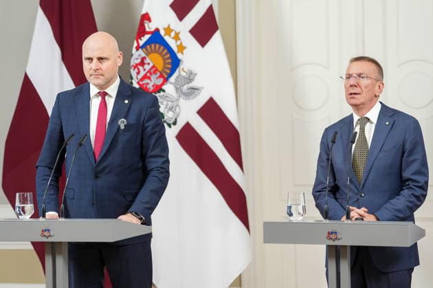 October 7, 2026, Riga, LATVIA: Latvian President EDGARS RINKEVICS (R) and Current Latvian Prime Minister and candidate for Prime Minister of the new government, ANDRIS KULBERGS attend the delivery of a statement by Latvian President in Riga, Latvia, 07 October 2026. Riga LATVIA - ZUMAp305 20261007_zip_p305_006 Copyright: xEdijsxPalensx