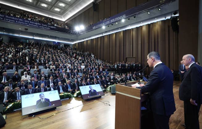 Legislative Year Opening Meeting with AK Party Deputies ANKARA, TURKIYE - OCTOBER 7: (----EDITORIAL USE ONLY - MANDATORY CREDIT - TURKISH PRESIDENCY MURAT CETINMUHURDAR HANDOUT - NO MARKETING NO ADVERTISING CAMPAIGNS - DISTRIBUTED AS A SERVICE TO CLIENTS----) Turkish President and Leader of the Justice and Development (AK) Party Recep Tayyip Erdogan (R) stands as Izmir Metropolitan Municipality Mayor Cemil Tugay (L) delivers a speech during the Legislative Year Opening Meeting with AK Party Deputies at the AK Party Congress Center in Ankara, Turkiye on October 7, 2026. Turkish Presidency Murat Cetinmuhurdar Handout Anadolu Ankara Turkey. Editorial use only. Please get in touch for any other usage.  Copyright: x2026xAnadoluxTurkishxPresidencyx MuratxCetinmuhurdarx xHandoutx