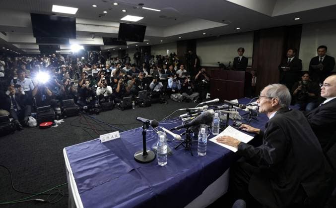 Nobel chemistry prize co-winner Soai Kenso Soai (front), a professor emeritus at the Tokyo University of Science, attends a press conference at the university in Tokyo on Oct. 7, 2026, after receiving the 2026 Nobel Prize in Chemistry. Soai and French researcher Henri Kagan shared the prize for the discovery of non-linear effects and autocatalysis in asymmetric organic synthesis, the Royal Swedish Academy of Sciences said earlier in the day.  A14AA0005630369P