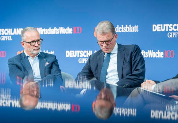 Carsten Knobel + Christian Sewing EUR, Deutschland, Berlin, 07.10.2026: (l-r) Carsten Knobel CEO Henkel und Christian Sewing CEO Deutsche Bank, besuchen die in Berlin stattfindene Jubiläumsveranstaltung von 80 Jahre Handelsblatt und 100 Jahre WirtschaftsWoche.