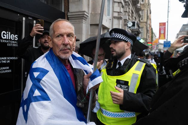 Pro-Palestinian protesters march In London LONDON, UNITED KINGDOM - OCTOBER 7: Pro-Israel counter-demonstrators stand opposite a pro-Palestinian student march in London, United Kingdom, on October 7, 2026, marking the third anniversary of the October 7, 2023 attacks. Thomas Krych Anadolu London United Kingdom. Editorial use only. Please get in touch for any other usage.  Copyright: x2026xAnadoluxThomasxKrychx