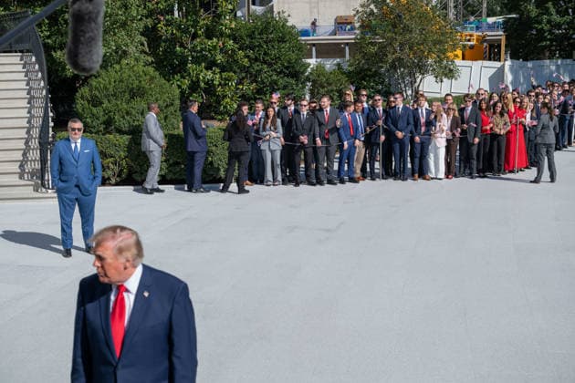 October 7, 2026, Washington, District Of Columbia, United States: Sen. TED CRUZ and visitors look on as President DONALD TRUMP speaks to reporters on the South Lawn of the White House before departing for San Antonio, Texas. Washington United States  - ZUMAk206 20261007_znp_k206_005 Copyright: xMattxKaminskyx