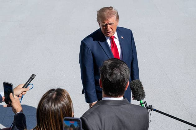 October 7, 2026, Washington, District Of Columbia, United States: President DONALD TRUMP speaks to reporters on the South Lawn of the White House before departing for San Antonio, Texas, where he is scheduled to headline a midterm campaign rally at Freeman Coliseum as Republicans seek to boost turnout and support candidates including Texas Attorney General KEN PAXTON. Washington United States  - ZUMAk206 20261007_znp_k206_010 Copyright: xMattxKaminskyx