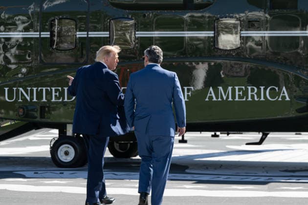 October 7, 2026, Washington, District Of Columbia, United States: President DONALD TRUMP walks with Sen. TED CRUZ toward Marine One on the South Lawn of the White House before departing for San Antonio, Texas, where Trump is scheduled to headline a midterm campaign rally. Washington United States - ZUMAk206 20261007_znp_k206_013 Copyright: xMattxKaminskyx