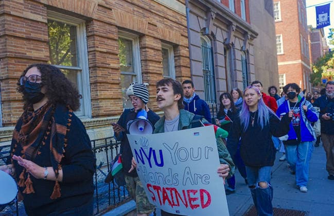 Pro-Palestinian protest at New York University NEW YORK, UNITED STATES - OCTOBER 04: A group of pro-Palestinian New York University (NYU) students walked out of classes to protest NYU and Israel, and marched outside the school buildings in New York, U.S., on October 7, 2026, marking the anniversary of the October 7 attacks on Gaza. Selcuk Acar Anadolu New York United States. Editorial use only. Please get in touch for any other usage.  Copyright: x2026xAnadoluxSelcukxAcarx