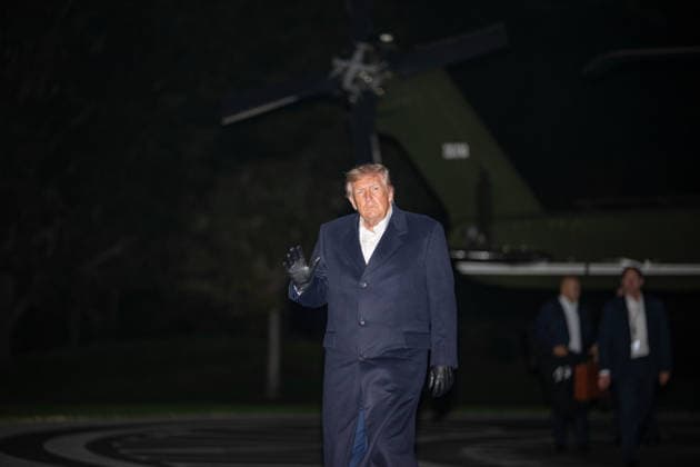 October 8, 2026, Washington, District Of Columbia, United States: President DONALD TRUMP walks across the South Lawn of the White House after arriving aboard Marine One following a trip to San Antonio, Texas, where he attended a campaign rally ahead of the November midterm elections. Washington United States  - ZUMAk206 20261008_znp_k206_003 Copyright: xMattxKaminskyx