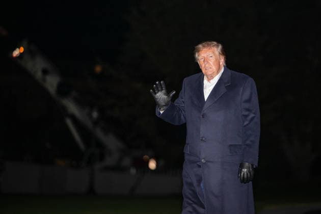 October 8, 2026, Washington, District Of Columbia, United States: President DONALD TRUMP walks across the South Lawn of the White House after arriving aboard Marine One following a trip to San Antonio, Texas, where he attended a campaign rally ahead of the November midterm elections. Washington United States  - ZUMAk206 20261008_znp_k206_005 Copyright: xMattxKaminskyx