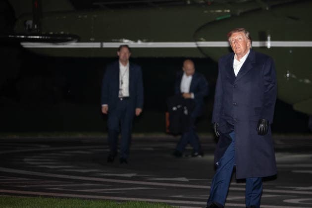 October 8, 2026, Washington, District Of Columbia, United States: President DONALD TRUMP walks across the South Lawn of the White House after arriving aboard Marine One following a trip to San Antonio, Texas, where he attended a campaign rally ahead of the November midterm elections. Washington United States  - ZUMAk206 20261008_znp_k206_010 Copyright: xMattxKaminskyx