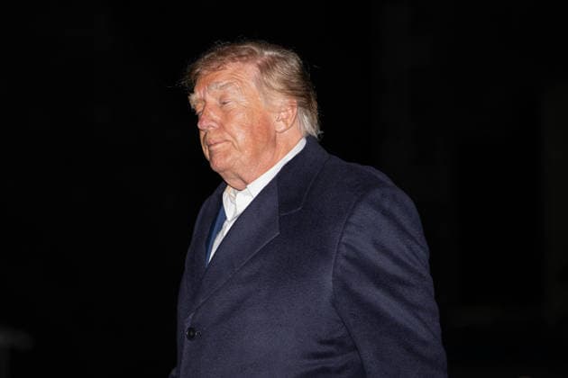 October 8, 2026, Washington, District Of Columbia, United States: President DONALD TRUMP walks across the South Lawn of the White House after arriving aboard Marine One following a trip to San Antonio, Texas, where he attended a campaign rally ahead of the November midterm elections. Washington United States  - ZUMAk206 20261008_znp_k206_018 Copyright: xMattxKaminskyx