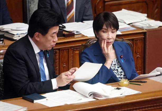 October 8, 2026, Tokyo, Japan - Japanese Prime Minister Sanae Takaichi (R) chats with Chief Cabinet Secretary Minoru Kihara (L) at Lower House s plenary session at the National Diet in Tokyo on Monday, October 8, 2026. (photo by Yoshio Tsunoda AFLO)  aflo_354274214
