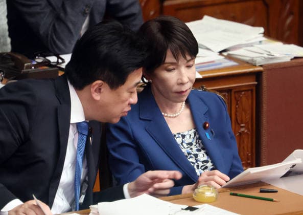 October 8, 2026, Tokyo, Japan - Japanese Prime Minister Sanae Takaichi (R) chats with Chief Cabinet Secretary Minoru Kihara (L) at Lower House s plenary session at the National Diet in Tokyo on Monday, October 8, 2026. (photo by Yoshio Tsunoda AFLO)  aflo_354274215