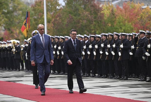 British Prime Minister Burnham welcomed with military ceremony in Berlin BERLIN, GERMANY - OCTOBER 8: German Chancellor Friedrich Merz (L) and British Prime Minister Andy Burnham (2nd L) walk past the honour guards with a military ceremony at the Federal Chancellery in Berlin, Germany, on October 8, 2026. Halil Sagirkaya Anadolu Berlin Germany. Editorial use only. Please get in touch for any other usage.  Copyright: x2026xAnadoluxHalilxSagirkayax