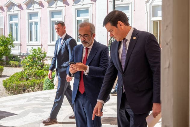 October 8, 2026, Lisbon, Lisbon, Portugal: U.S. Secretary of State MARCO RUBIO, right, and Portugal s Minister of State and Foreign Affairs PAULO RANGEL enter their joint press conference at the Palacio das Necessidades in Lisbon, Portugal, on October 8, 2026. RANGEL checks his phone as the two officials arrive for the media appearance following their bilateral meeting. Lisbon Portugal - ZUMAr238 20261008_zip_r238_005 Copyright: xRicardoxRochax