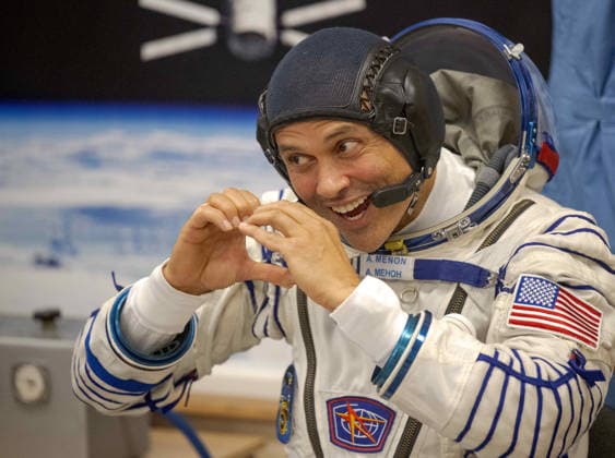October 8, 2026, Baikonur, Kazakhstan: Baikonur, Kazakhstan. 14 July, 2026. NASA astronaut Anil Menon gestures to family and friends while waiting for his Sokol suit pressure check at the Baikonur Cosmodrome, July 14, 2026 in Baikonur, Kazakhstan. He launched to the International Space Station later that day. Baikonur Kazakhstan - ZUMAp138 20261008_zaa_p138_050 Copyright: xBillxIngalls Nasax