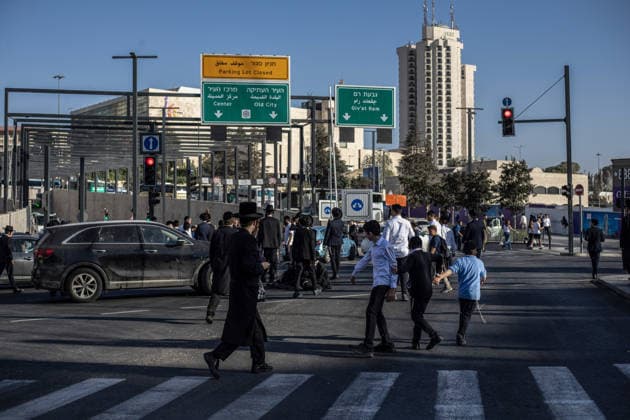 Anti-military service Ultra-Orthodox Jews block road to West Jerusalem JERUSALEM - OCTOBER 8: Ultra-Orthodox Jews, known as Haredi, protest the lack of legislation exempting yeshiva students from mandatory military service and the detention of students on grounds of draft evasion in West Jerusalem, on October 8, 2026. Haredi protesters lie on the road leading to West Jerusalem and block traffic, while Israeli police deployed to the scene intervene against the demonstrators. Mostafa Alkharouf Anadolu Jerusalem Israel. Editorial use only. Please get in touch for any other usage.  Copyright: x2026xAnadoluxMostafaxAlkharoufx