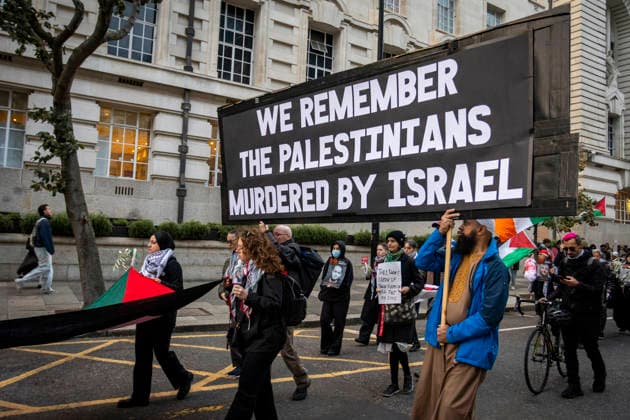 Pro-Palestine Silent Funeral Procession Central London, October 8, 2026 A pro-Palestine silent funeral procession took place in Central London, with demonstrators walking in silence to remember Palestinians killed in the conflict in Gaza. Participants carried Palestinian flags and placards, while some held a coffin and others carried effigies wrapped in burial shrouds, symbolising those killed in the conflict., Credit:Zak Irfan Avalon  Copyright: xZakxIrfanx xAvalonx 1141550662
