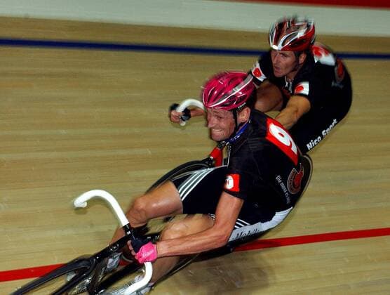 Rolf Aldag (Deutschland, vorn) und Scott McGrory (Australien) - Wechsel) Radsport Herren 63. Dortmunder Sechstagerennen 2004, Sechstage, Sechs, Sixdays, six days, Rad, Bahn, Halle, Indoor Gruppe Dortmund, Rennen