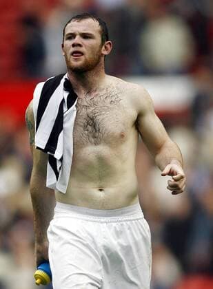 Wayne Rooney (Manchester United) hat ein Trikot des Gegners Newcastle erbeutet - EDITORIAL USE ONLY. No use with unauthorised audio, video, data, fixture lists, club league logos or live services. Online in-match use limited to 120 images, no video emulation. No use in betting, games or single club league player publications. Fußball Herren English Premier League 2006 2007, 1. Englische Liga, Manchester United, ManU Einzelbild Manchester Fußball Herren English Premier League 2006 2007, 1. Englische Liga, Manchester United, ManU Einzelbild Manchester